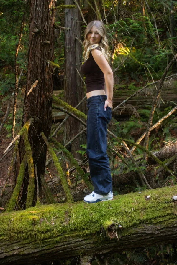 Lynden looking back over her shoulder in warm outdoor light